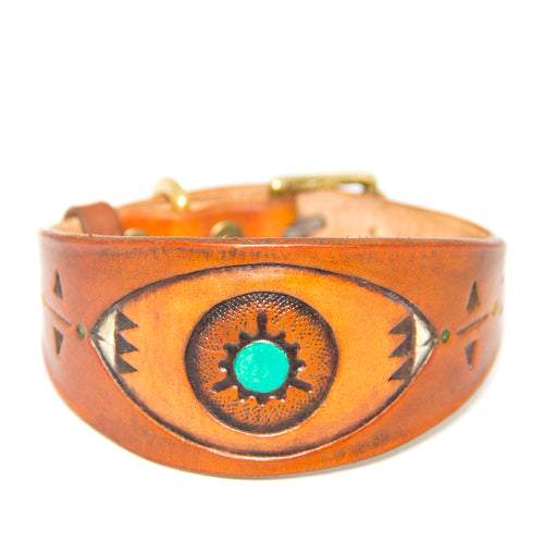 Hand-made and dyed collar from veg-tanned cow leather. Buckle and D-ring in solid brass which will develop a beautiful patina with time. Handtooled design, dye and acrylic paint.